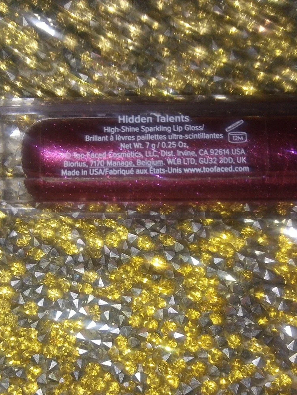 Too Faced Dual-Tone Lip Gloss — Light Pink Base with Shimmering Plum